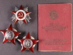 Řád vlastenecké války II. st. č.301299, 2x Řád rudé hvězdy č.3405846 a 3417911, k tomu řádová knížka
