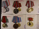 Spojka vyznamenání, 8 ks. + udělovací knížky + 6 dalších medailí s průkazy