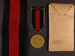 Pamětní medaile na 1. Oktober 1938, udělovací sáček a část pásky s razítkem