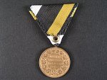 Pamětní medaile na válku Prusko Dánskou s nápisem na hraně (nová stužka)