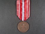 Pamětní odznak pro čs. dobrovolníky z let 1918-1919 s monogramem OP