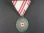Stříbrná čestná medaile za zásluhy o červený kříž s válečnou dekorací, Ag