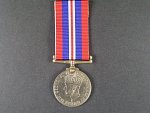 Válečná medaile 1939-45, na hraně vyraženo jméno G.E.Ludditt