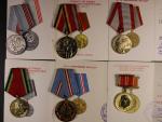 Spojka vyznamenání, 8 ks. + udělovací knížky + 6 dalších medailí s průkazy
