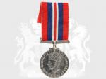 Válečná medaile 1939-45, na hraně opis V377378 E. F. Morton