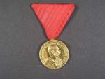 Záslužná medaile Za 40 let věrné služby z r. 1898, na stuze pro civilní osoby, zlacený bronz