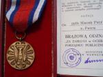 Medaile Za zasluhy + udelovaci knizka