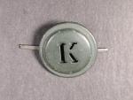 Čepicový odznak K