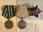 Řád rudé hvězdy č.1860227, 6. typ, Medaile za bojové zásluhy č. 1896501 a Medaile za dobytí Královce, k tomu řádová knížka a udělovací průkaz