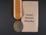Německá pamětní medaile za budování obranného valu + udělovací sáček