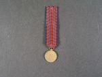 Miniatura medaile pro dobrovolníky 1952