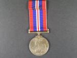 Válečná medaile 1939-45, na hraně vyraženo jméno G.E.Ludditt