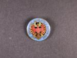 Patriotický odznak, Tyrolská orlice rámovaná modře smaltovaným kruhem s nápisem, MIT HERZ UND HAND FuR´S ALPENLAND, upínání na vodorovnou jehlu, zlacený bronz, smalty